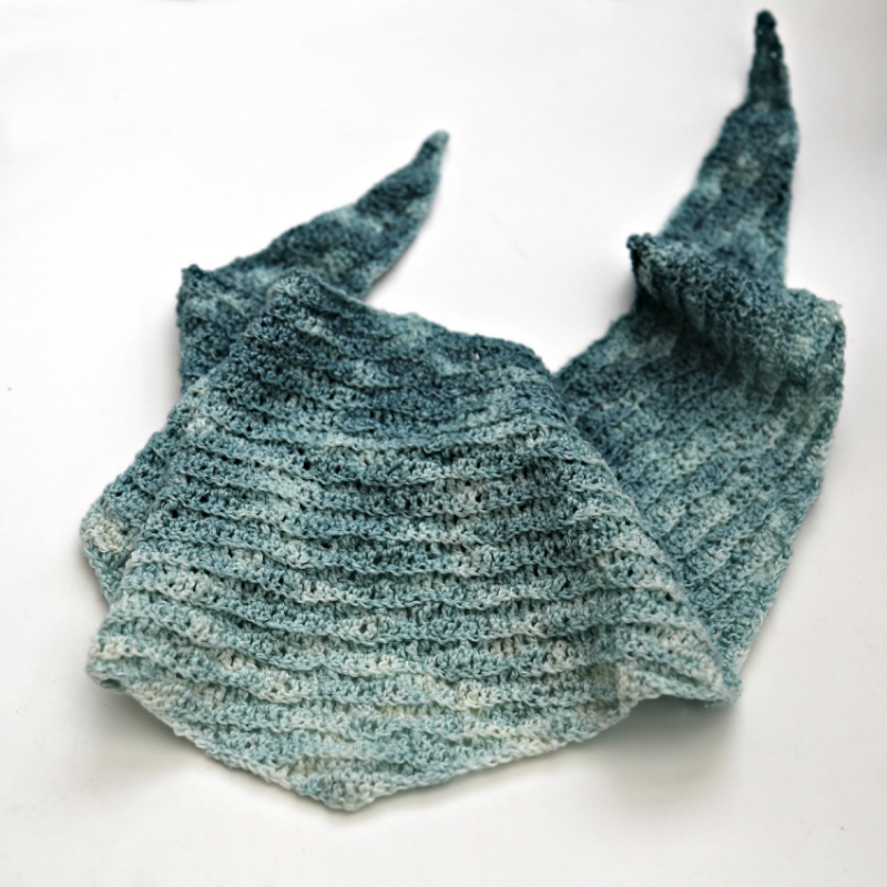 A shawl with a simple wave texture pattern.