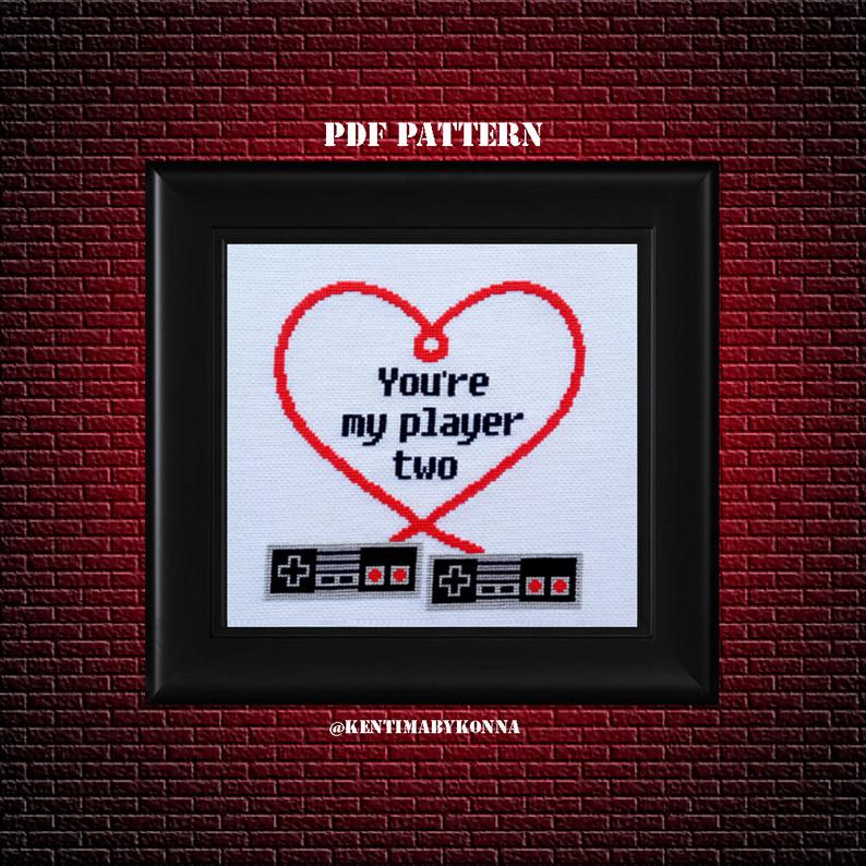 Image of completed You're My Player Two cross-stitch pattern.