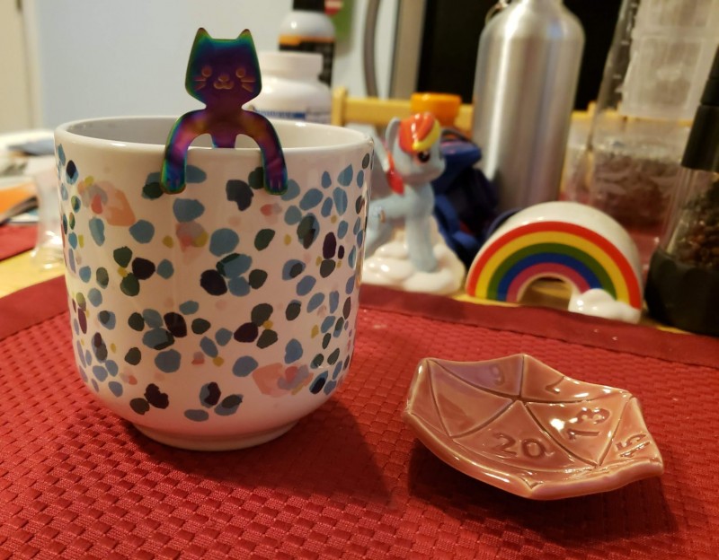 Gen Con Haul 2019: From Dryad Teas, a kitty tea spoon and one of their limited edition D20 teabag holders!