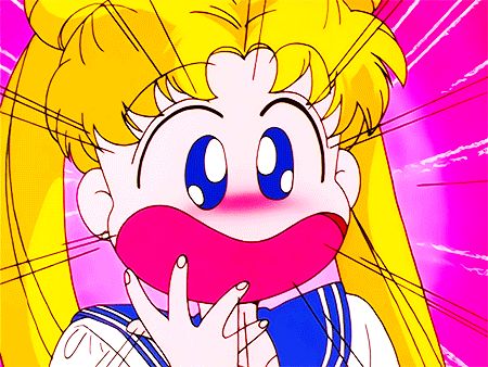 A still frame from the anime Sailor Moon, showing Usagi looking very panicked.